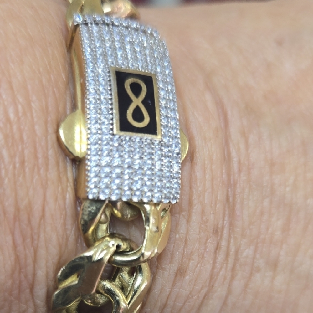 Elegant Gold and Silver Bracelet with Black Accent